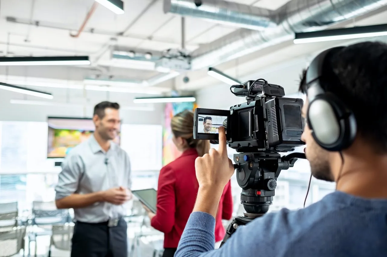 International film crew recording a corporate interview in Vietnam
