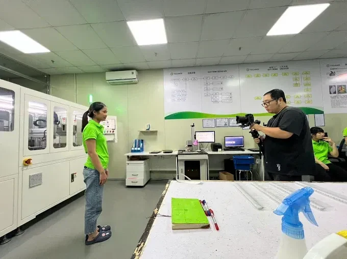 Filming cleanroom operator at Fullandi factory Vietnam